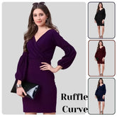 Woman wearing a purple dress with ruffled sleeves, holding a black clutch, on a light gray background.