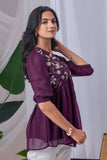 Elegant embroidered purple top for casual wear

