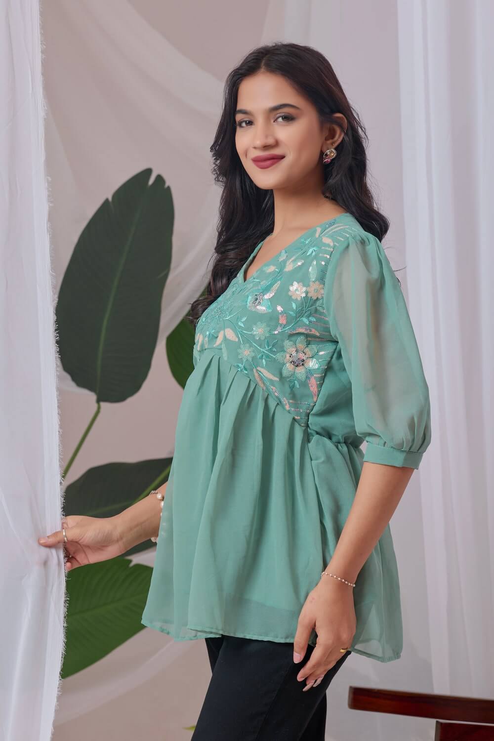 Elegant light green georgette top with embroidery

