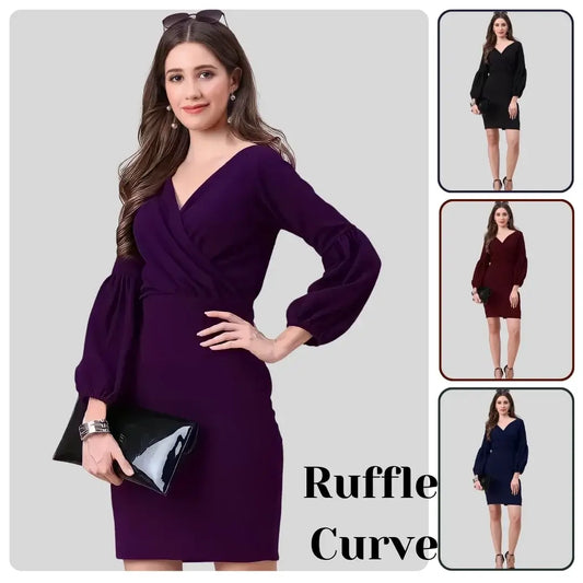 Woman wearing a purple dress with ruffled sleeves, holding a black clutch, on a light gray background.