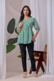 Soft light green embroidered top casual and party wear

