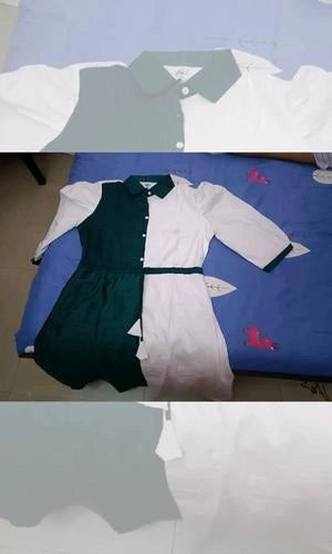 Green and white shirt with a collar on a blue surface