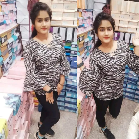 Happy customer wearing Zelzis tunic
