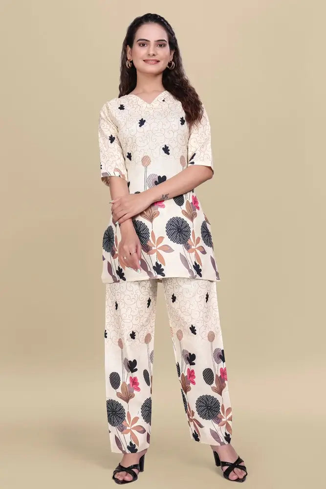 Woman wearing a floral outfit on a beige background