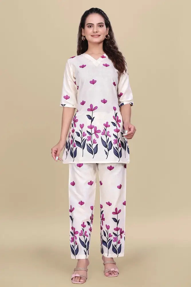 Woman wearing a white floral outfit on a beige background