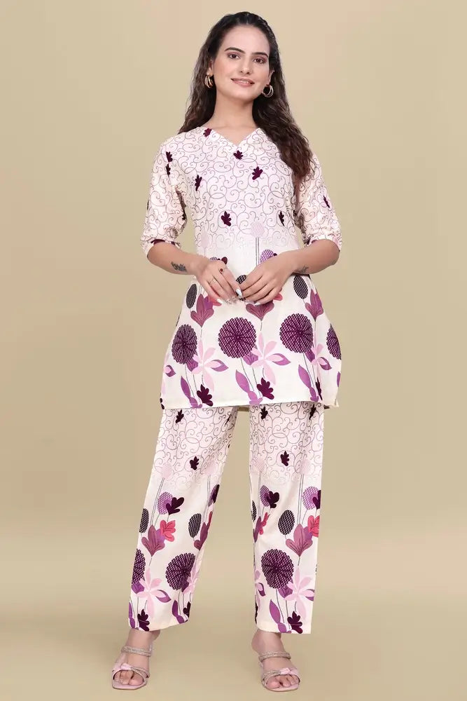 Woman wearing a floral outfit on a beige background