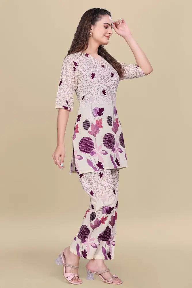 Woman wearing a floral outfit on a beige background