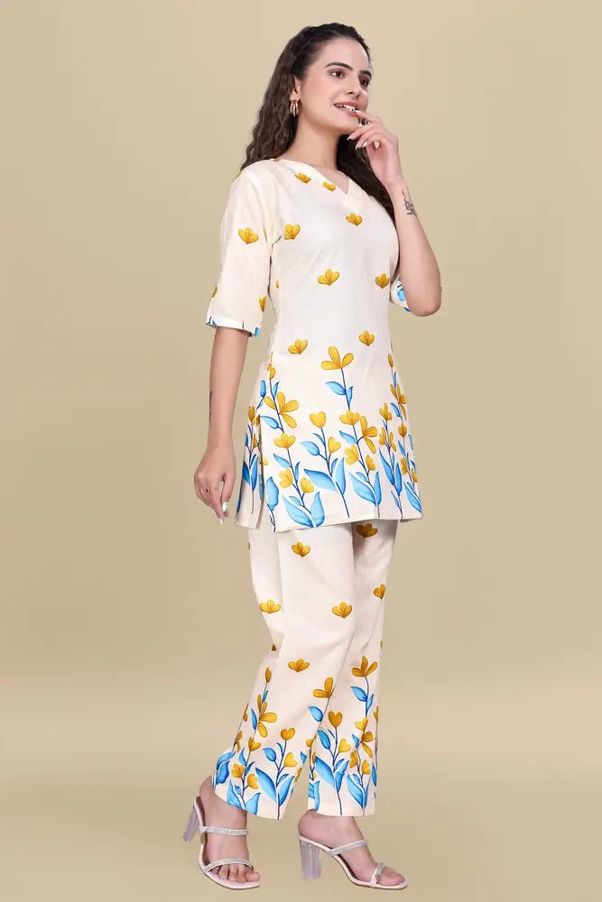 Woman wearing a floral printed outfit on a beige background