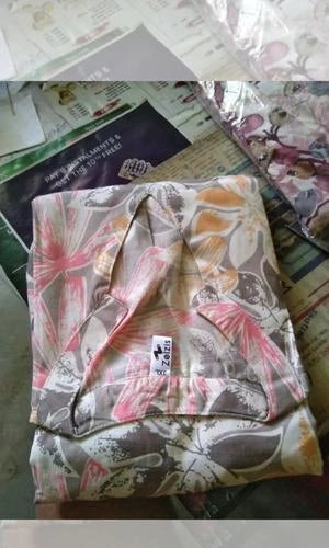 Floral-patterned fabric on a textured surface