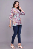 Zelzis women’s purple tunic with beautiful floral details
