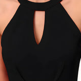 Chic black solid fit & flare knee-length sleeveless wrap dress by ZELZIS

