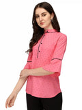 elegant pink polka dot top with collar neck and hip length
