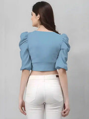 stylish light blue solid polyester crop top with tie-up collar neck
