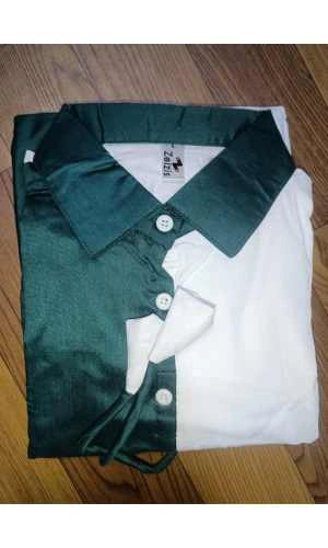 Green and white shirt on a wooden surface